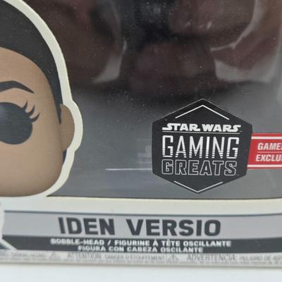 LOT 194: NIB Star Wars Funko Pops Including The Bad Batch Set and 2 Iden Versio, R2-D2 Measuring Cup Set, and Millennium Falcon...