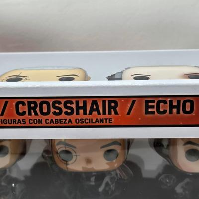 LOT 194: NIB Star Wars Funko Pops Including The Bad Batch Set and 2 Iden Versio, R2-D2 Measuring Cup Set, and Millennium Falcon...