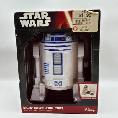LOT 194: NIB Star Wars Funko Pops Including The Bad Batch Set and 2 Iden Versio, R2-D2 Measuring Cup Set, and Millennium Falcon...