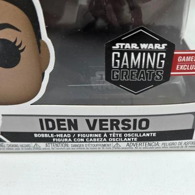 LOT 194: NIB Star Wars Funko Pops Including The Bad Batch Set and 2 Iden Versio, R2-D2 Measuring Cup Set, and Millennium Falcon...