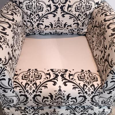 LOT 5: Black and White Upholstered Swivel/Rocking Chair
