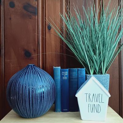 LOT 14: Contemporary Home Decor Including Crate & Barrel Vase, Rae Dunn Travel Fund Bank, and Scott Living Artificial Grass Plant and...