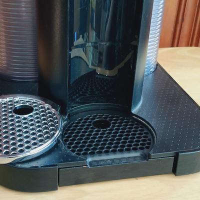 LOT 21: Nespresso VertuoLine Type GCA1 Coffee and Espresso Maker with Harry Potter Gryffindor Mug and Espresso Cups
