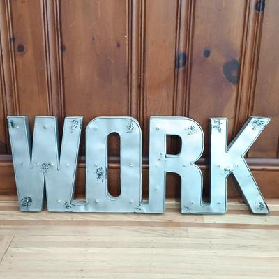 LOT 22: Inspirational Pastel Spring Decor Including LED Cinematic Light Box. Plaques, a Metal “WORK” Sign and More