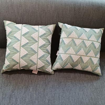 LOT 32: Large Assortment of Various Sized Throw Pillows and Down Alternative Filled Pillows with Stylish Pillow Cases