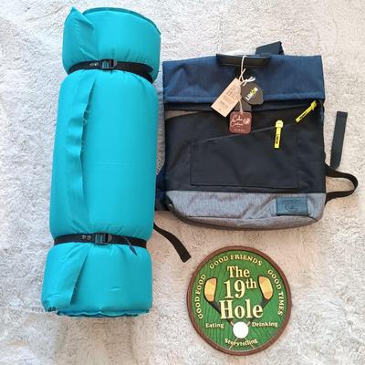 LOT 49: Limon Bonobo Back Pack with Tags, Insul-x- Mat and 19th Hole Sign