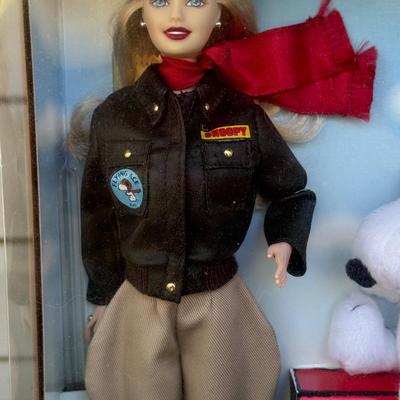LOT 44P: NRFB Mattel Barbie Collector Edition Dolls: Tale of Peter Rabbit (19360), Barbie & Snoopy (55558) & Curious George (28789)