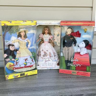 LOT 44P: NRFB Mattel Barbie Collector Edition Dolls: Tale of Peter Rabbit (19360), Barbie & Snoopy (55558) & Curious George (28789)