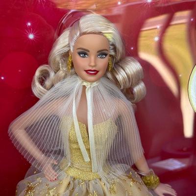 LOT 53P: NRFB Mattel Holiday Barbie Dolls: Barbie Signature 35th Anniversary 2023 Holiday Barbie (HJX04) & Two 2003 Special Edition...