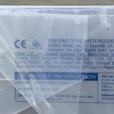 LOT 53P: NRFB Mattel Holiday Barbie Dolls: Barbie Signature 35th Anniversary 2023 Holiday Barbie (HJX04) & Two 2003 Special Edition...