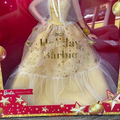 LOT 53P: NRFB Mattel Holiday Barbie Dolls: Barbie Signature 35th Anniversary 2023 Holiday Barbie (HJX04) & Two 2003 Special Edition...