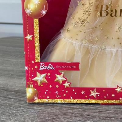 LOT 53P: NRFB Mattel Holiday Barbie Dolls: Barbie Signature 35th Anniversary 2023 Holiday Barbie (HJX04) & Two 2003 Special Edition...