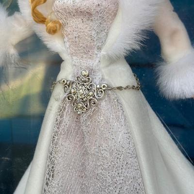 LOT 53P: NRFB Mattel Holiday Barbie Dolls: Barbie Signature 35th Anniversary 2023 Holiday Barbie (HJX04) & Two 2003 Special Edition...