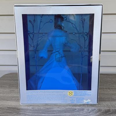 LOT 53P: NRFB Mattel Holiday Barbie Dolls: Barbie Signature 35th Anniversary 2023 Holiday Barbie (HJX04) & Two 2003 Special Edition...