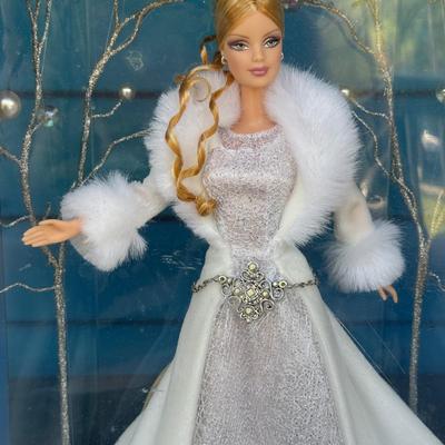 LOT 53P: NRFB Mattel Holiday Barbie Dolls: Barbie Signature 35th Anniversary 2023 Holiday Barbie (HJX04) & Two 2003 Special Edition...