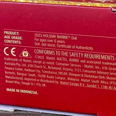 LOT 53P: NRFB Mattel Holiday Barbie Dolls: Barbie Signature 35th Anniversary 2023 Holiday Barbie (HJX04) & Two 2003 Special Edition...