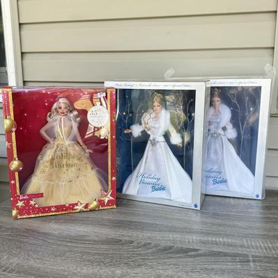 LOT 53P: NRFB Mattel Holiday Barbie Dolls: Barbie Signature 35th Anniversary 2023 Holiday Barbie (HJX04) & Two 2003 Special Edition...