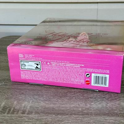 LOT 54P: NRFB Mattel Barbie Collector Holdiay Dolls: 2007 (K7958), 2009 (L9643) & 2009 (N6656)