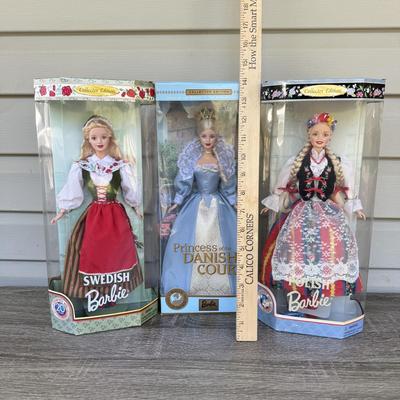 LOT 57H: NRFB Mattel Barbie Collector Edition Dolls of the World: 1997 Polish Barbie (18560), 1999 Swedish Barbie (24672) & 2002...