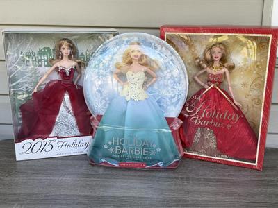 LOT 74P: NRFB Mattel Barbie Collector Holiday Barbie Dolls: 2014 (BDH13), 2015 (CHR76) & The Peace Hope Love Collection 2016 (DGX98)
