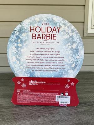 LOT 74P: NRFB Mattel Barbie Collector Holiday Barbie Dolls: 2014 (BDH13), 2015 (CHR76) & The Peace Hope Love Collection 2016 (DGX98)