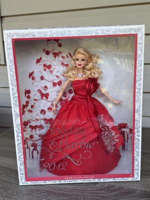 LOT 76P: NRFB Mattel Barbie Collector Holiday Barbies: 2010 (R4545), 2011 (T7914), 2012 (W3465) & 2013 (X8271)