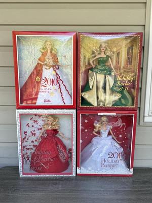 LOT 76P: NRFB Mattel Barbie Collector Holiday Barbies: 2010 (R4545), 2011 (T7914), 2012 (W3465) & 2013 (X8271)