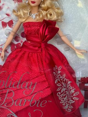 LOT 76P: NRFB Mattel Barbie Collector Holiday Barbies: 2010 (R4545), 2011 (T7914), 2012 (W3465) & 2013 (X8271)