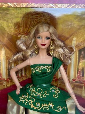 LOT 76P: NRFB Mattel Barbie Collector Holiday Barbies: 2010 (R4545), 2011 (T7914), 2012 (W3465) & 2013 (X8271)