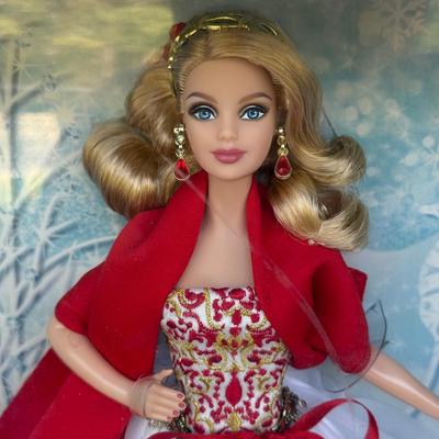 LOT 76P: NRFB Mattel Barbie Collector Holiday Barbies: 2010 (R4545), 2011 (T7914), 2012 (W3465) & 2013 (X8271)