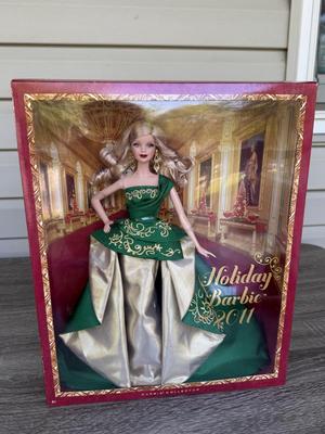 LOT 76P: NRFB Mattel Barbie Collector Holiday Barbies: 2010 (R4545), 2011 (T7914), 2012 (W3465) & 2013 (X8271)