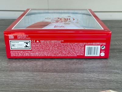LOT 76P: NRFB Mattel Barbie Collector Holiday Barbies: 2010 (R4545), 2011 (T7914), 2012 (W3465) & 2013 (X8271)