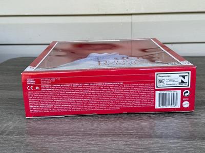 LOT 76P: NRFB Mattel Barbie Collector Holiday Barbies: 2010 (R4545), 2011 (T7914), 2012 (W3465) & 2013 (X8271)
