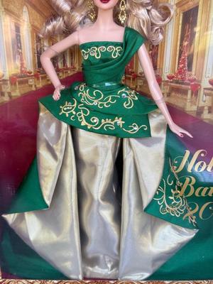LOT 76P: NRFB Mattel Barbie Collector Holiday Barbies: 2010 (R4545), 2011 (T7914), 2012 (W3465) & 2013 (X8271)