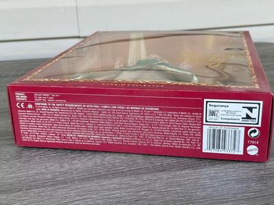 LOT 76P: NRFB Mattel Barbie Collector Holiday Barbies: 2010 (R4545), 2011 (T7914), 2012 (W3465) & 2013 (X8271)
