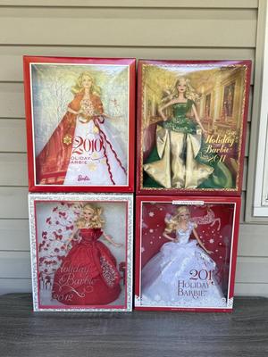 LOT 76P: NRFB Mattel Barbie Collector Holiday Barbies: 2010 (R4545), 2011 (T7914), 2012 (W3465) & 2013 (X8271)