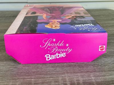 LOT 125P: NRFB 1997 Special Edition Barbie Dolls: Sparkle Beauty (17251), Evening Elegance Series Evening Enchantment (19783), Charity...