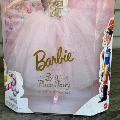LOT 127P: Mattel Barbie: Collector Edition Classic Ballet Series Barbie as the Sugar Plum Fairy (17056), 1997 Rapunzel Barbie (17646)...