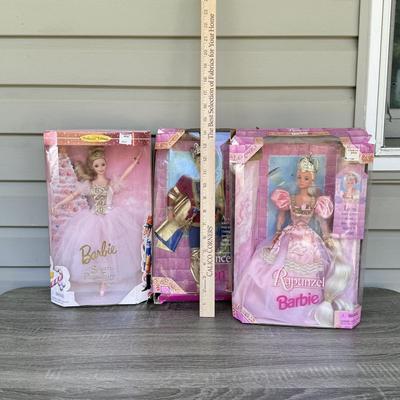 LOT 127P: Mattel Barbie: Collector Edition Classic Ballet Series Barbie as the Sugar Plum Fairy (17056), 1997 Rapunzel Barbie (17646)...