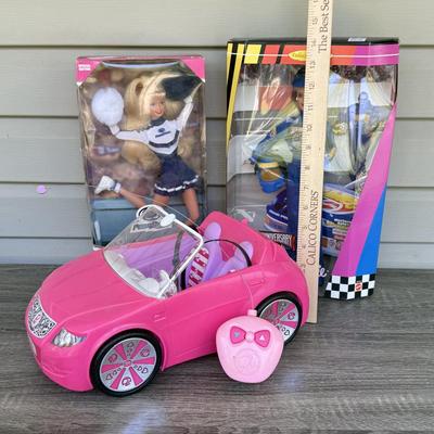 LOT 129P: 2011 Barbie R/C Convertible (untested - X5450) & NRFB Mattel: 1996 Penn State Cheerleader University (17698) & 1998...