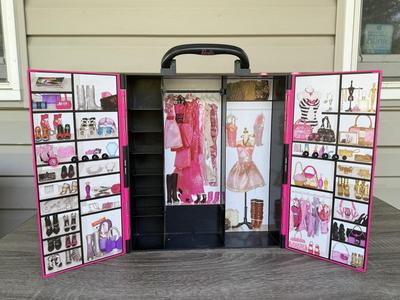 LOT 138P: Vintage & Contemporary Mattel Barbie Closets and Trunks