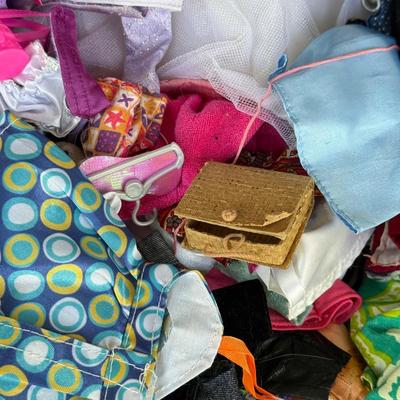 LOT 140P: Box of Barbie Sized Clothing & Accessories