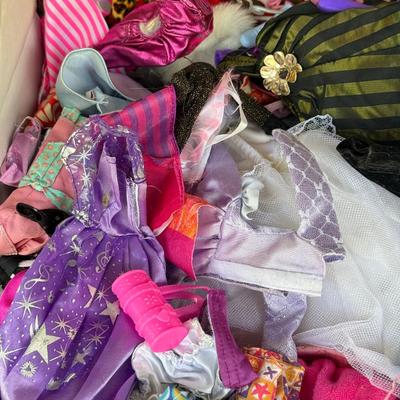 LOT 140P: Box of Barbie Sized Clothing & Accessories