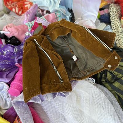 LOT 140P: Box of Barbie Sized Clothing & Accessories