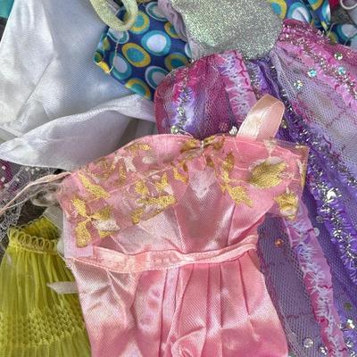 LOT 140P: Box of Barbie Sized Clothing & Accessories