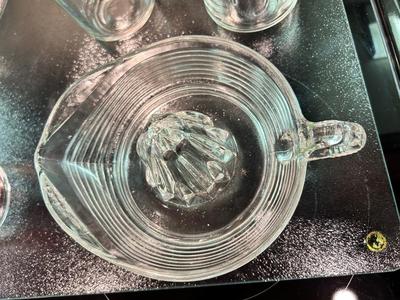 CLEAR GLASS KITCHEN MEASURING CUP, JUICER, JUICE GLASSES, MIXING BOWL, AND CUTTING BOARD