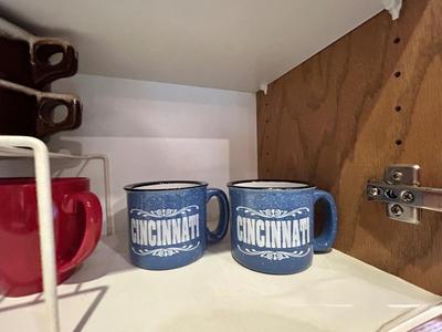 AN ASSORTMENT OF DRINKING VESSELS AND STONEWARE BOWLS