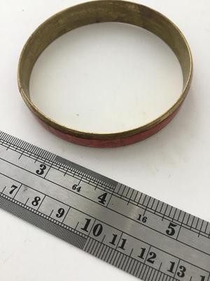 Gold tone red fashion bangle