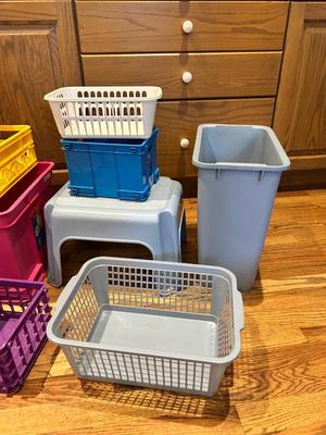 ORGANIZING STORAGE SOLUTIONS. A WASTE CAN AND STEP STOOL