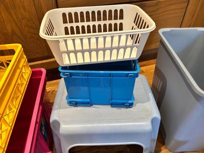 ORGANIZING STORAGE SOLUTIONS. A WASTE CAN AND STEP STOOL